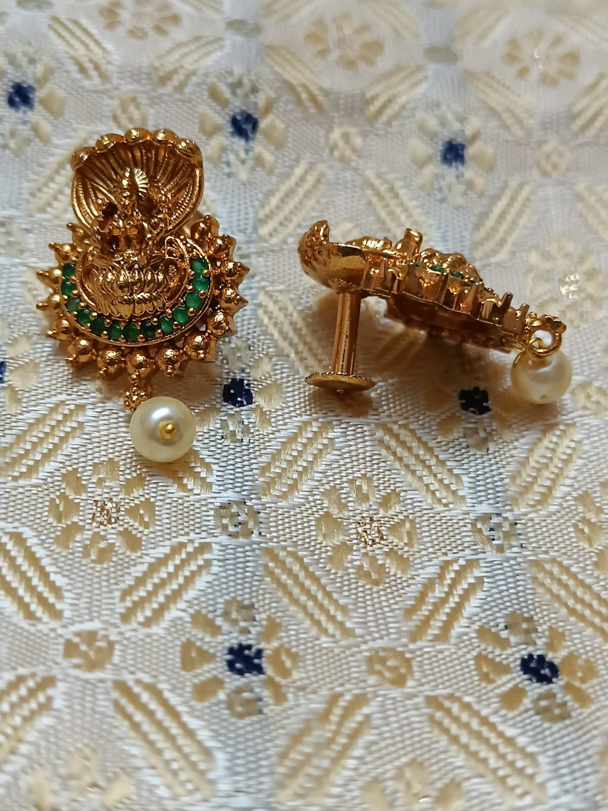 Lakshmi Green Stone Studded Earrings With Pearls