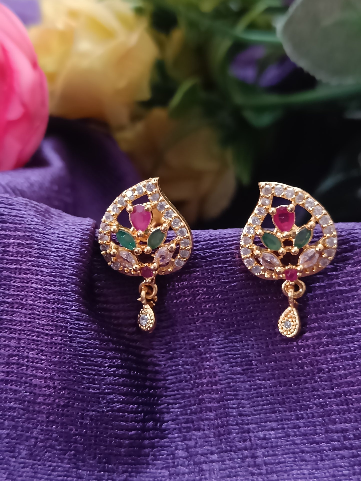 Multicoloured studs with red, green and AD stones