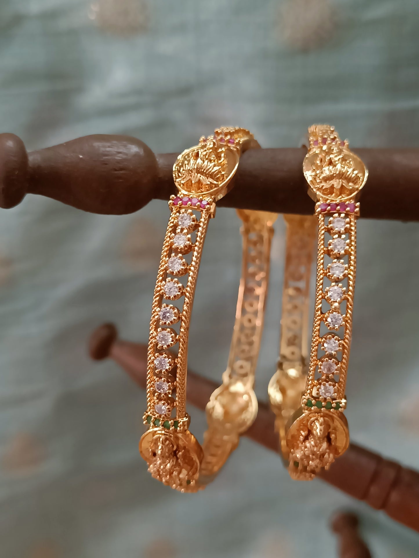 Traditional Matte Gold-Plated Temple Bridal Bangles With Lakshmi Motifs And AD Stones