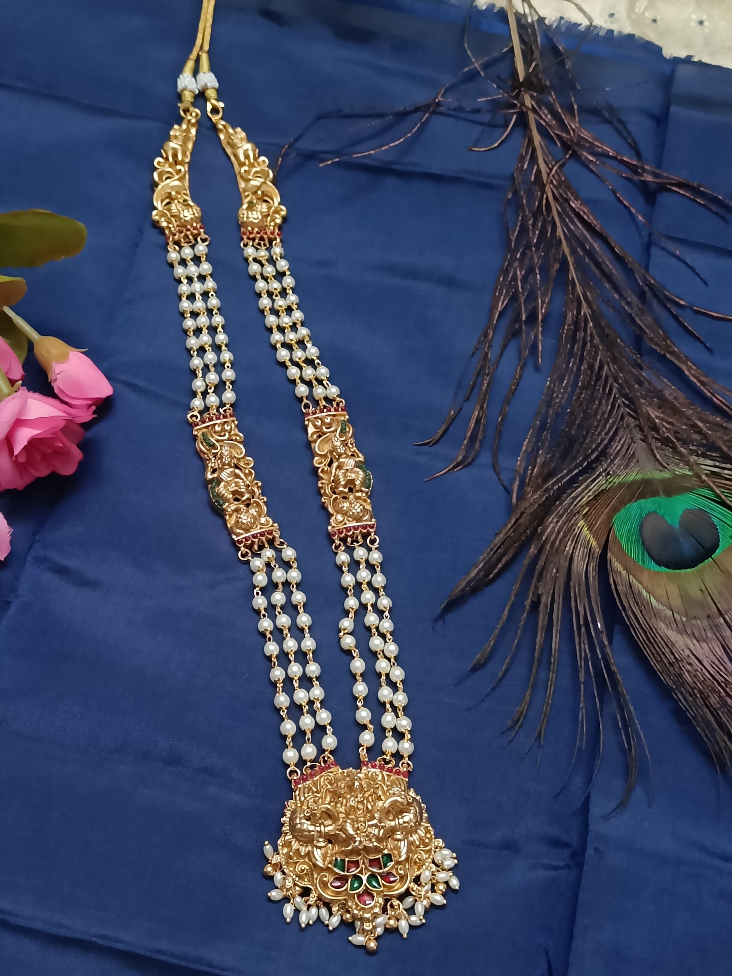 Lakshmi pendant set featuring charming dancing dolls, peacock and elephant motifs (Copy)