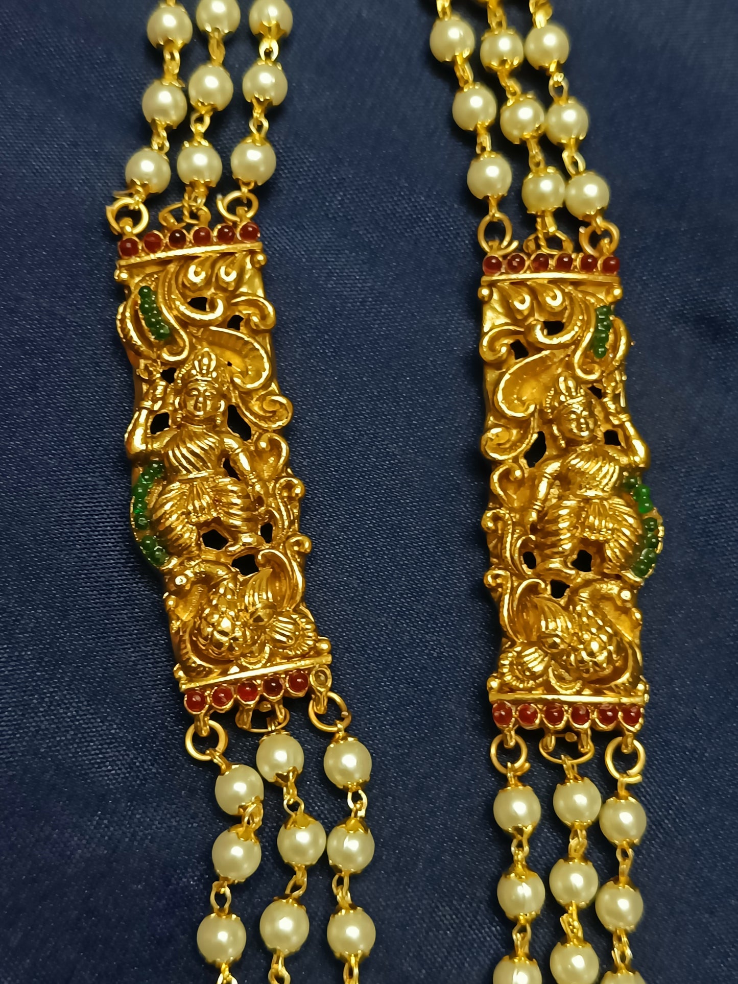 Lakshmi pendant set featuring charming dancing dolls, peacock and elephant motifs (Copy)