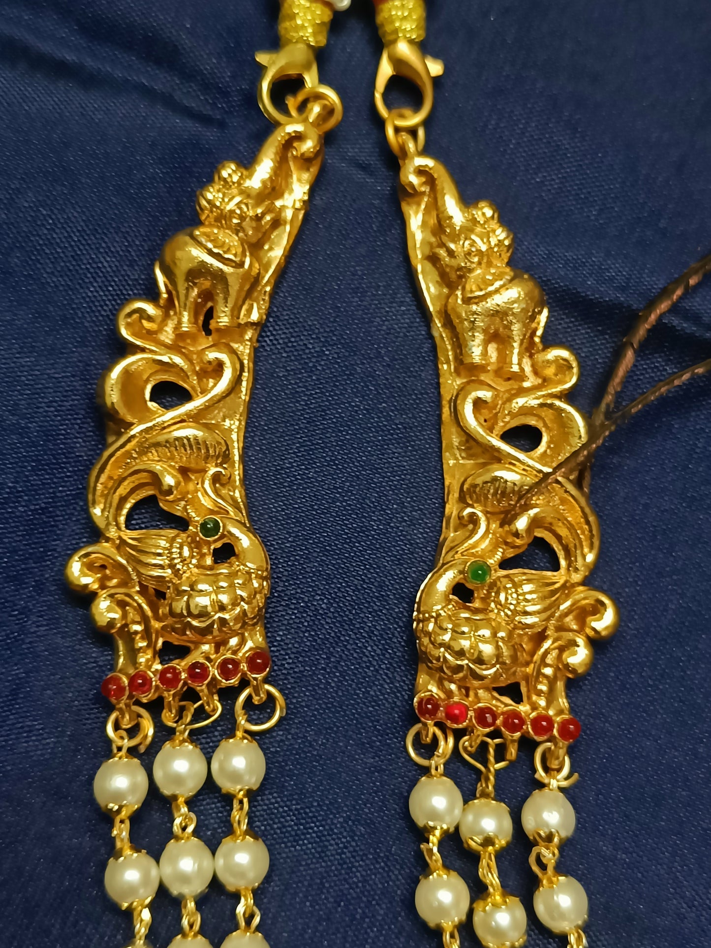 Lakshmi pendant set featuring charming dancing dolls, peacock and elephant motifs (Copy)