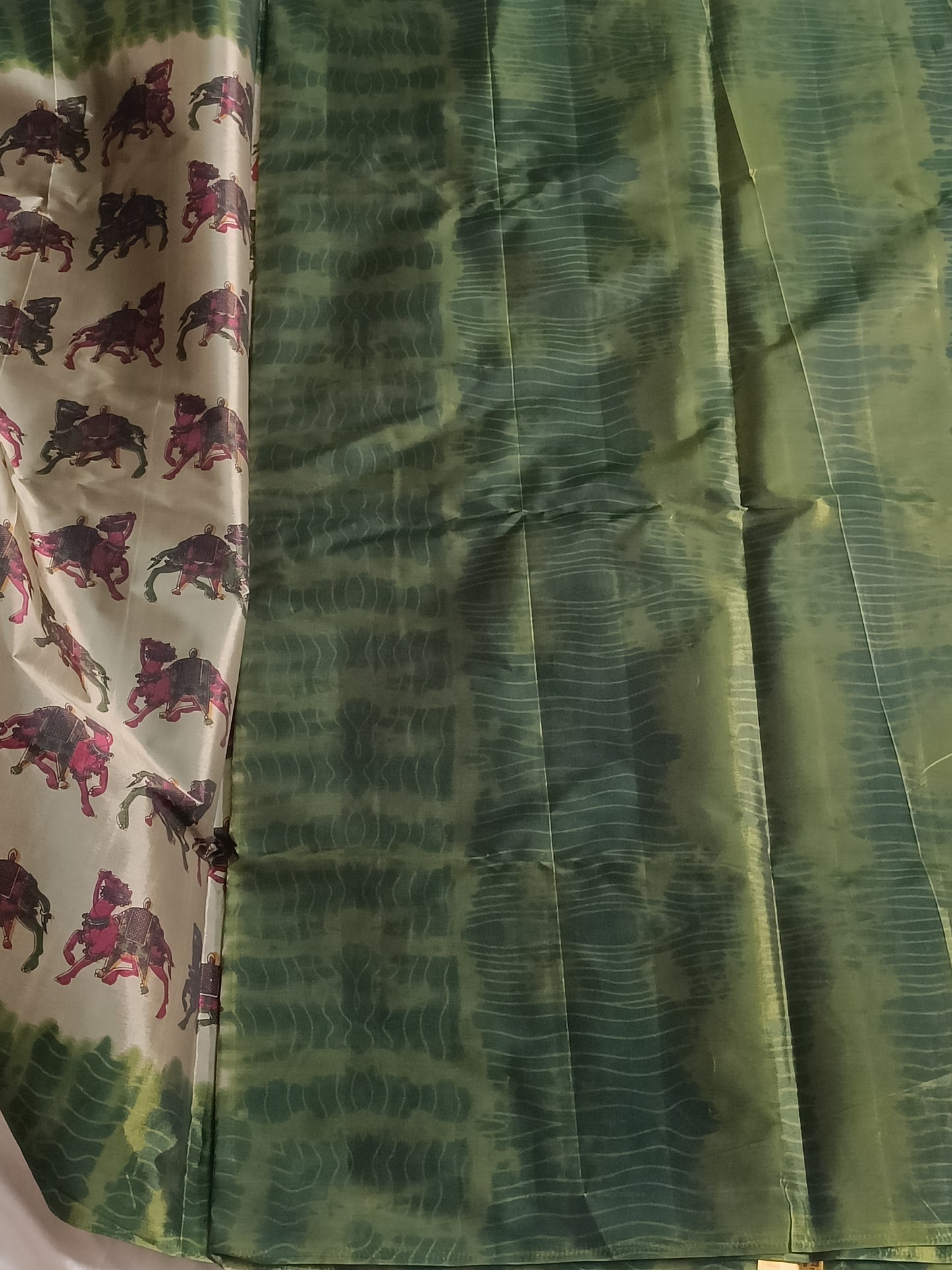 Grey Ikkat animal print saree with green border (Cotton-Silk)