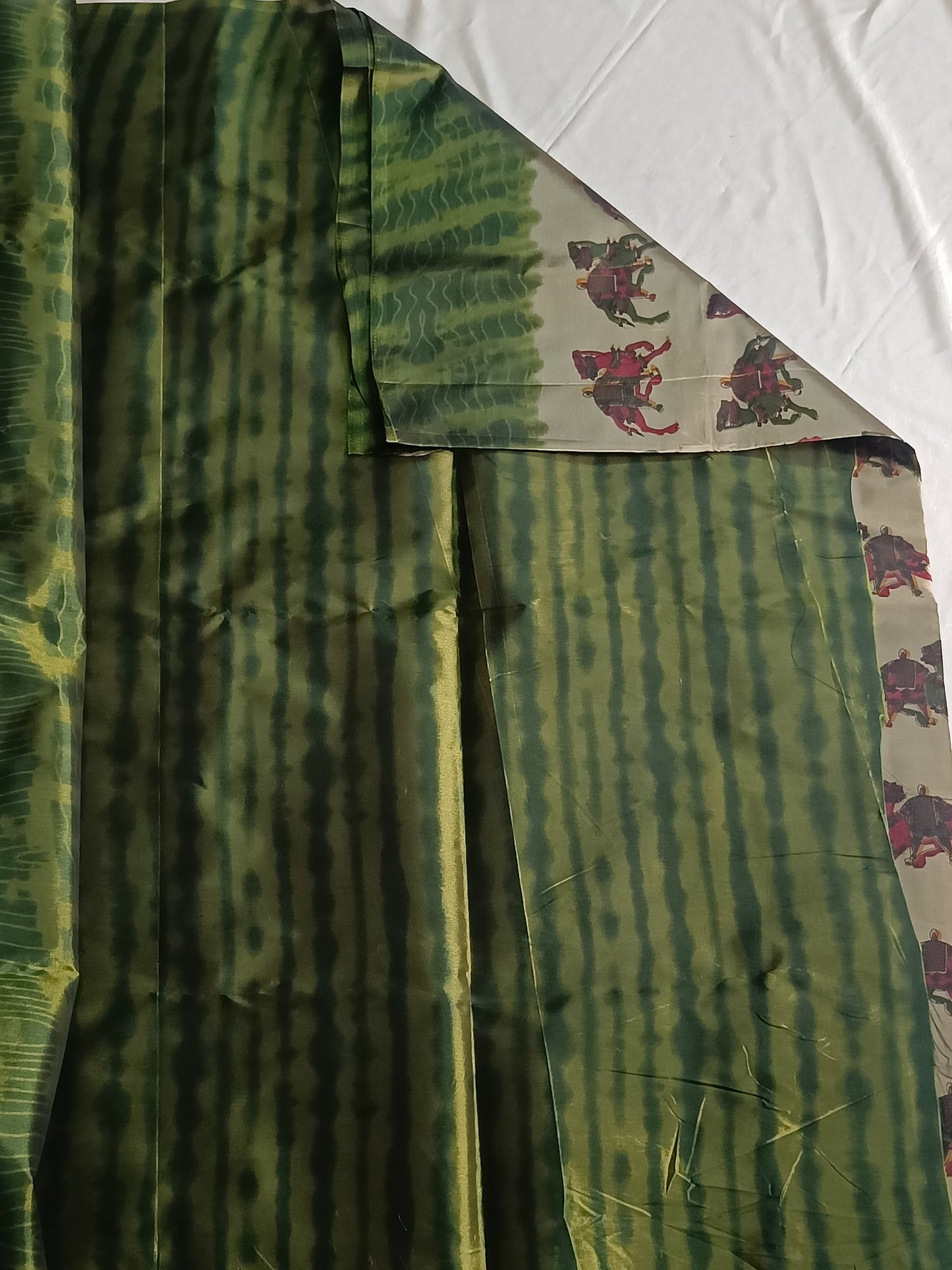 Grey Ikkat animal print saree with green border (Cotton-Silk)