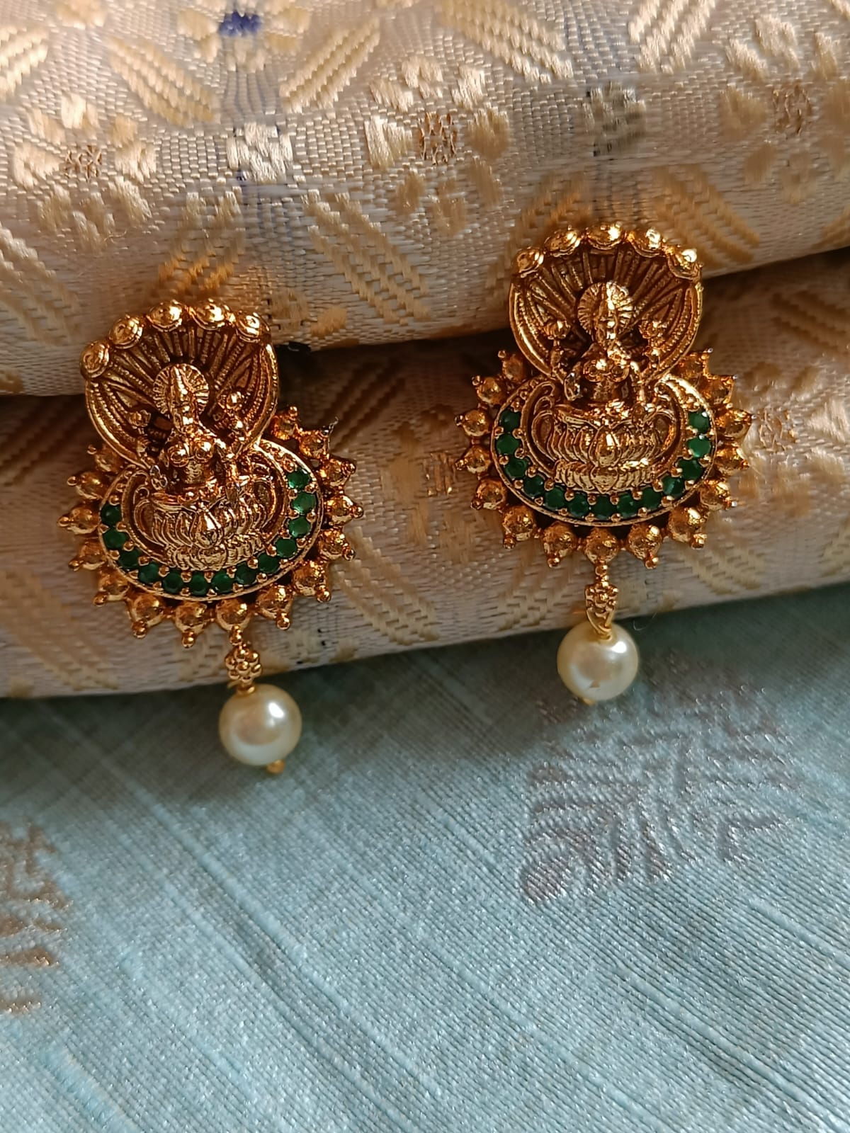 Lakshmi Green Stone Studded Earrings With Pearls