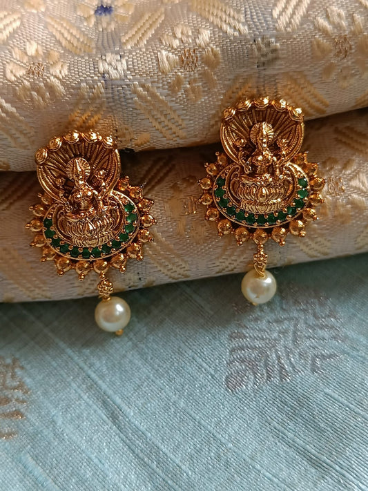 Lakshmi Green Stone Studded Earrings With Pearls